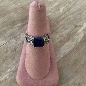 Elegant Sterling Silver Ring with Manmade Blue Sapphire